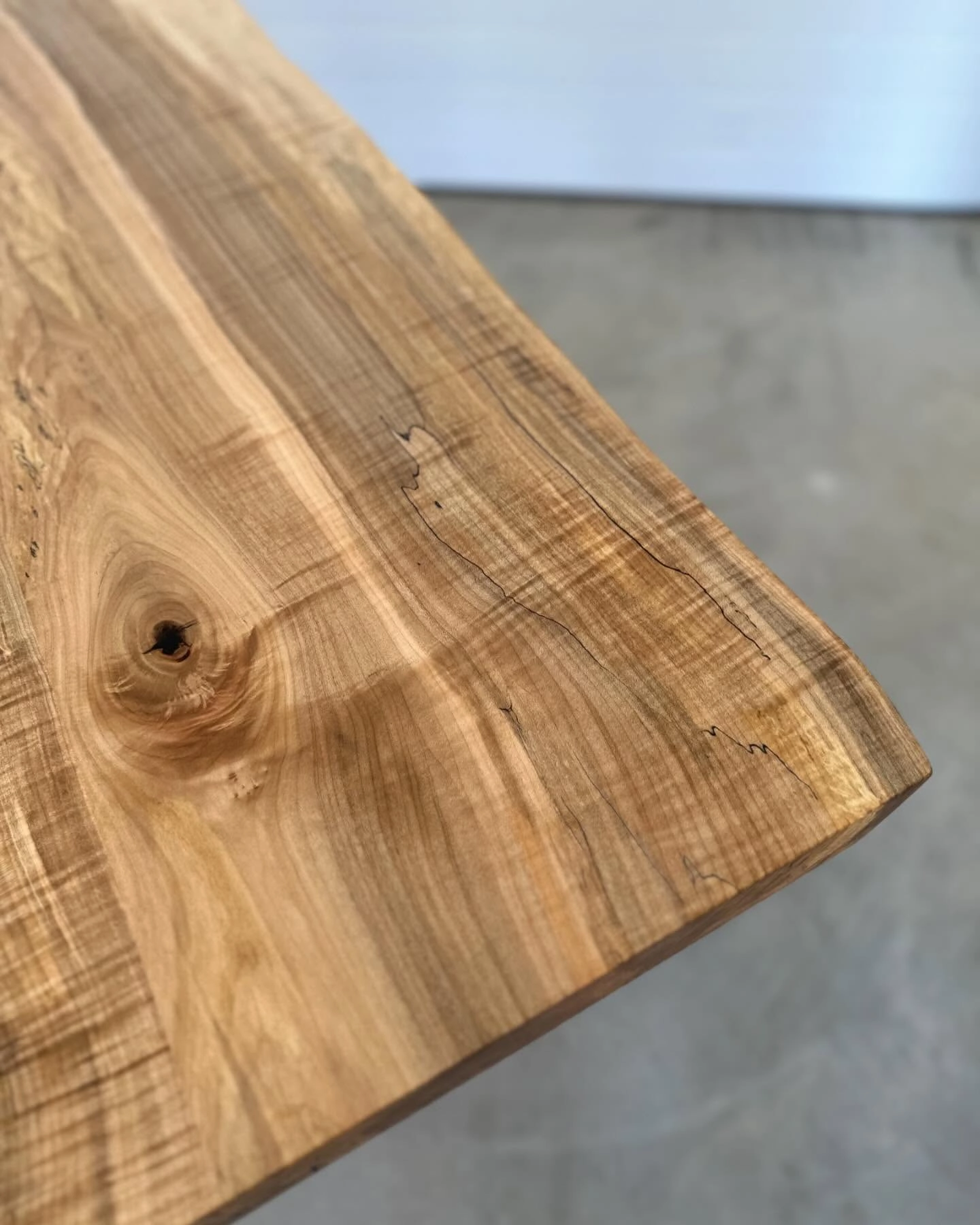 Spalted maple live edge with a knot, from the Layer table